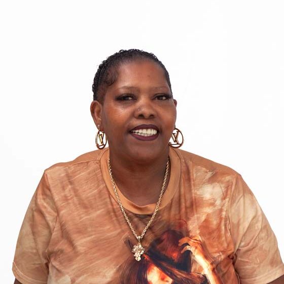 Profile image of Arlene Stanton, an African-American woman with close-cropped black hair.