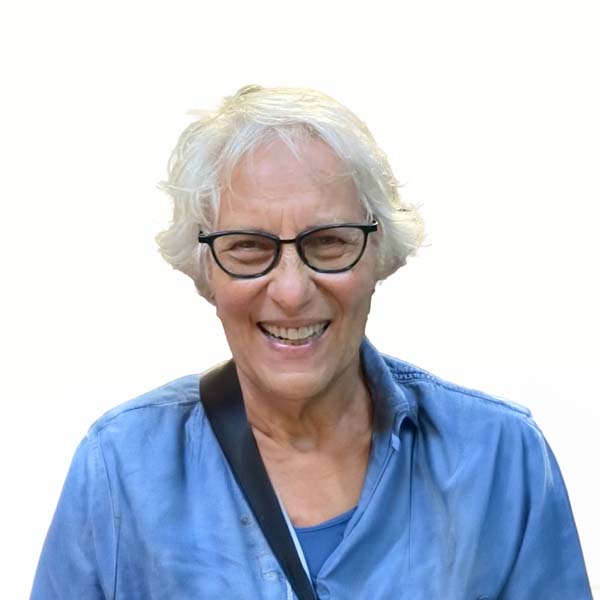 Profile image of Peg Langham, a White woman with short white hair and black-rimmed eyeglasses.